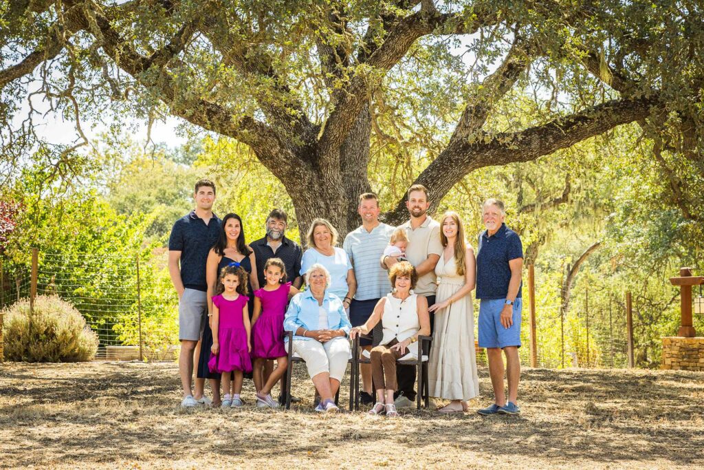 Extended family portrait beneath a majestic oak tree in Paso Robles, California
